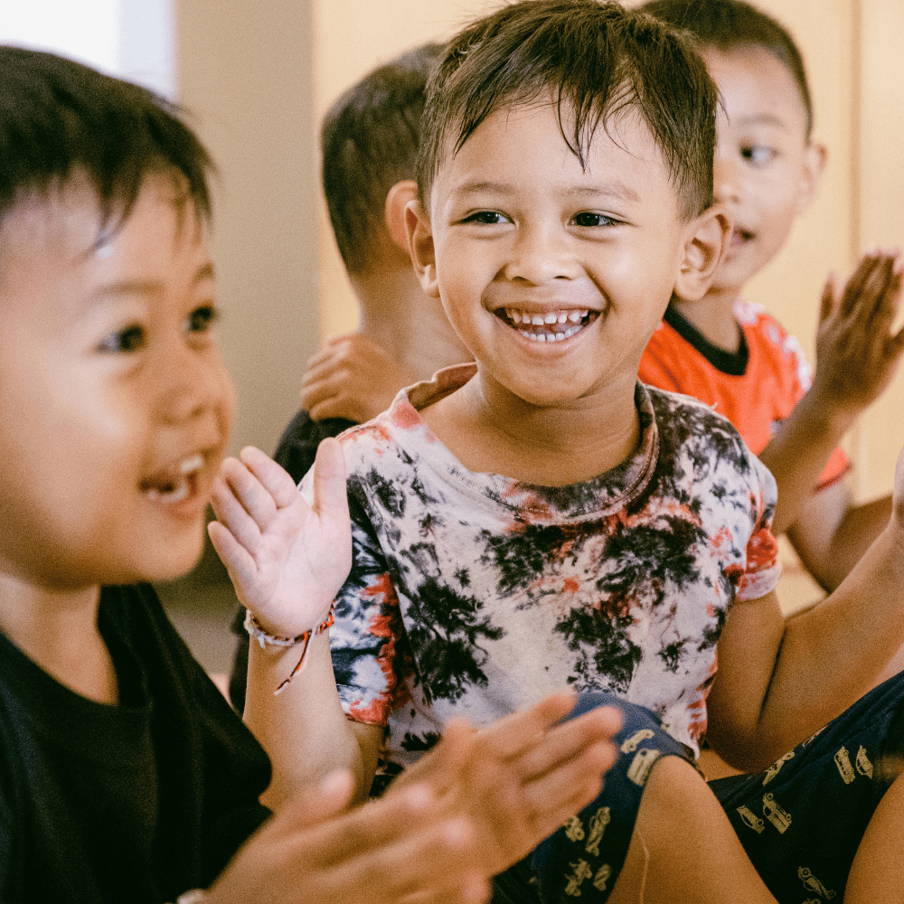 Children smiling and clapping